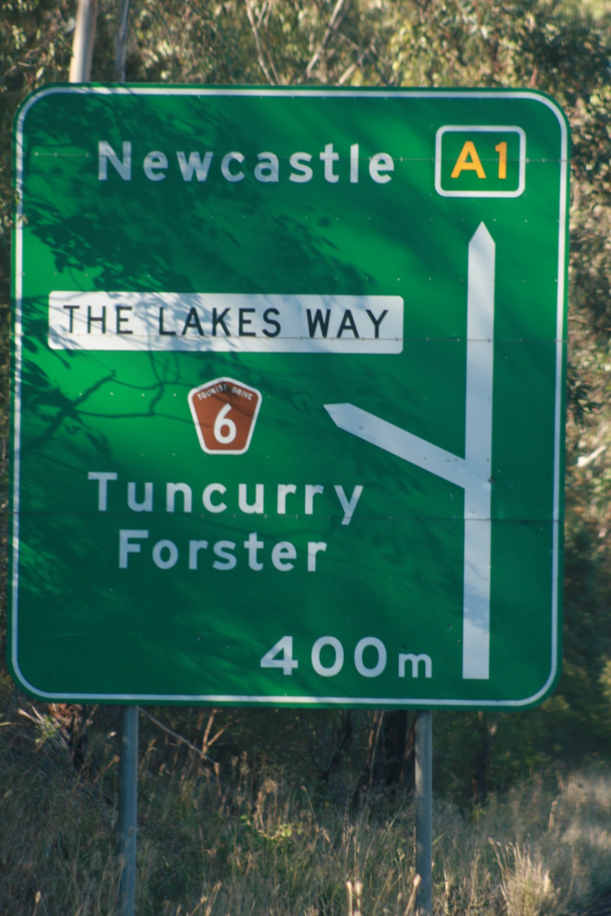 image of road sign from north